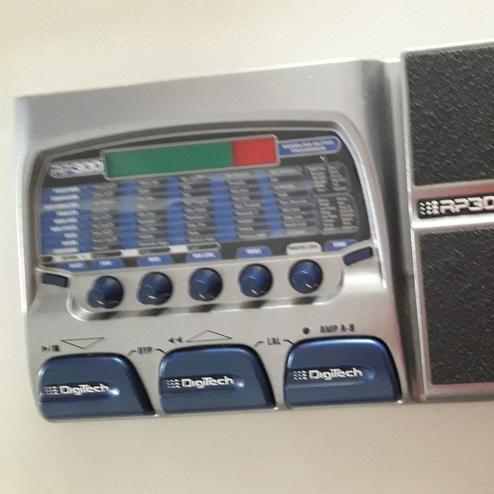 DigiTech RP300 Guitar Multi-Effect Processor with power supply.